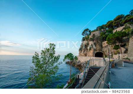 View on Fort Antoine Ian Theatre and Pescher tunnel  and Mediterranean Sea. Idyllic pine trees on rock in morning of summer on Monaco 98423568