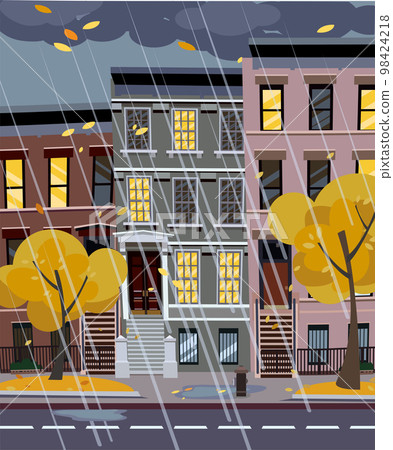 Flat cartoon vector illustration of autumn rainy city street at night. 3-4-story uneven houses with luminous windows,. Street cityscape. Evening town landscape with trees in the foreground, puddles Flat cartoon vector illustration of autumn rainy city street at night. 3-4-story uneven houses with luminous windows,. Street cityscape. Evening town landscape with trees in the foreground, puddles 98424218