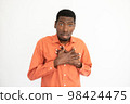 Portrait of ashamed young man touching chest 98424475