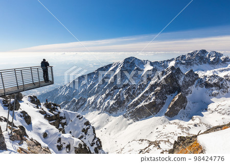 Snowy winter high mountain landscape. Snowy winter high mountain landscape. 98424776