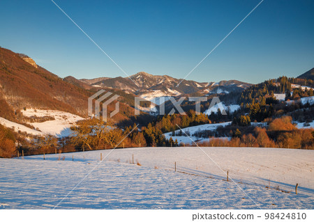 Landscape of snowy winter mountains. Landscape of snowy winter mountains. 98424810