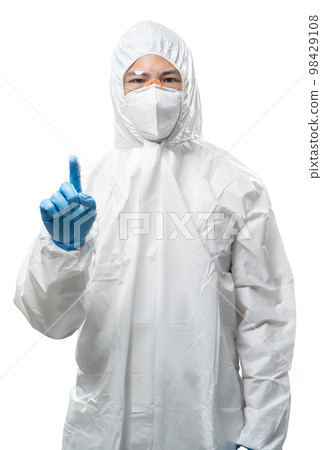Worker wears medical protective suit or white coverall suit finger point isolated on white 98429108