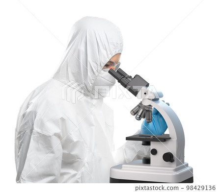 Worker wears medical protective suit or white coverall suit look through microscope isolated on white Worker wears medical protective suit or white coverall suit look through microscope isolated on white 98429136