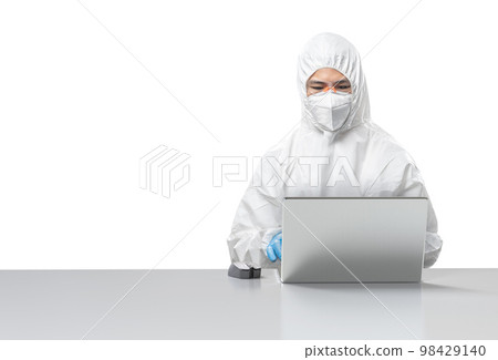 Worker wears medical protective suit or white coverall suit work with computer notebook isolated on white 98429140