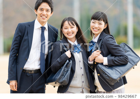 High school girls and boys lined up in the schoolyard 98429667