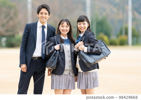 High school girls and boys lined up in the schoolyard 98429668