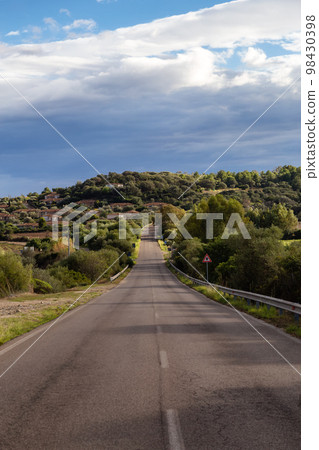 Scenic Road near a town by the Sea. Costa Rei, Sardinia, Italy. Scenic Road near a town by the Sea. Costa Rei, Sardinia, Italy. 98430398