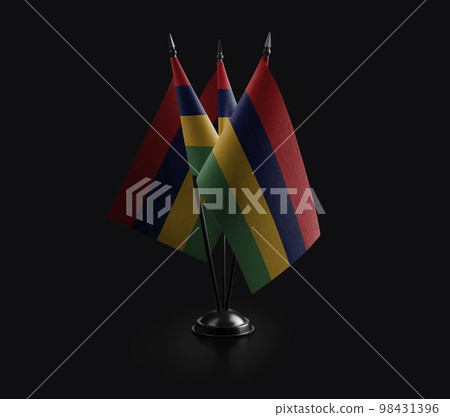 Small national flags of the Mauritius on a black background Small national flags of the Mauritius on a black background 98431396