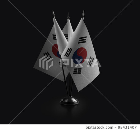 Small national flags of the South Korean on a black background Small national flags of the South Korean on a black background 98431407