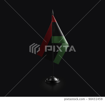 Small national flag of the Libya on a black background Small national flag of the Libya on a black background 98431459