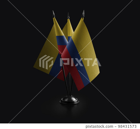 Small national flags of the Colombia on a black background 98431573