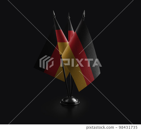 Small national flags of the Germany on a black background Small national flags of the Germany on a black background 98431735