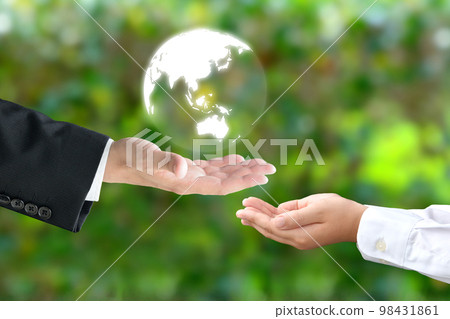 Eco/environmental protection image - Passing the earth from parents to children 98431861