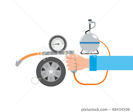 A worker who adjusts tire pressure A worker who adjusts tire pressure 98434506