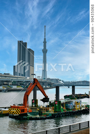View of Tokyo Skytree from Sumidagawa Terrace and dredging work near Shirahige Bridge View of Tokyo Skytree from Sumidagawa Terrace and dredging work near Shirahige Bridge 98435068