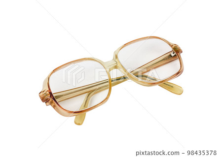 Grandma's glasses on a white background. Old fashioned glasses isolated on white background. Grandpa's old glasses. 98435378