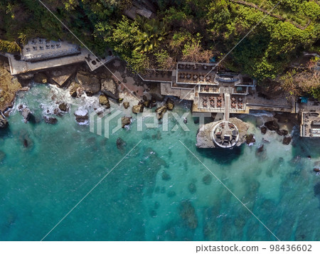 Aerial view of cafe at ocean coastline 98436602