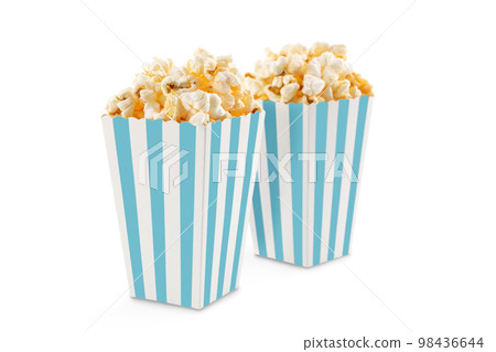 Two blue white striped carton buckets with tasty cheese popcorn, isolated on white background Two blue white striped carton buckets with tasty cheese popcorn, isolated on white background 98436644