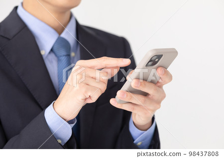 Businessman smartphone hand Businessman smartphone hand 98437808