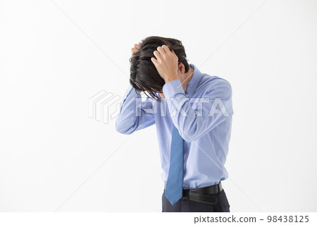 Businessman headache suffer 98438125