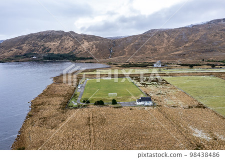 Aerial view of the GAA pitch next to Mount Errigal in Donegal - Ireland. 98438486