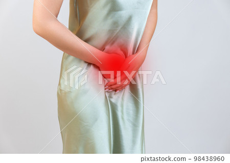 Menstrual pain, woman with stomachache suffering from pms , endometriosis, cystitis and other diseases of the urinary system, painful area highlighted in red Menstrual pain, woman with stomachache suffering from pms , endometriosis, cystitis and other diseases of the urinary system, painful area highlighted in red 98438960