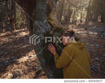 caucasian woman enjoys being in nature, caucasian woman enjoys being in nature, 98440057