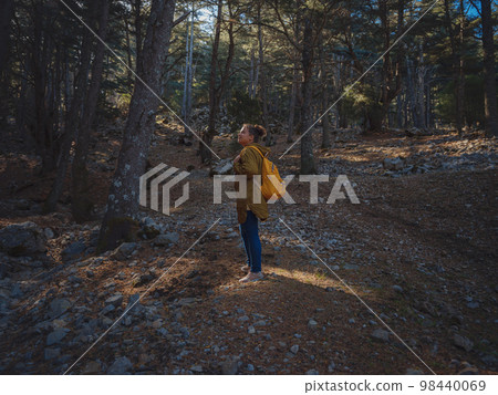 caucasian woman enjoys being in nature, caucasian woman enjoys being in nature, 98440069