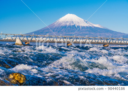 (Shizuoka Prefecture) Shinkansen crossing the Fuji River, Mt. Fuji in the background (Shizuoka Prefecture) Shinkansen crossing the Fuji River, Mt. Fuji in the background 98440186