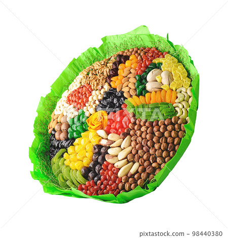 Big bouquet of various nuts, candied fruits and dried fruits isolated Big bouquet of various nuts, candied fruits and dried fruits isolated 98440380