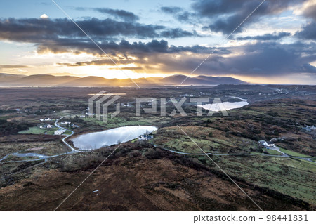 Aerial view sunset at Lough Fad in County Donegal - Ireland. Aerial view sunset at Lough Fad in County Donegal - Ireland. 98441831