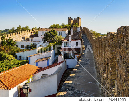 Stunning medieval walls surrounding the whitewashed houses of Obidos village, Oeste Region, Portugal 98441963