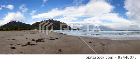 Sandy Beach at a Town on the Sea Coast. Foxi Manna, Sardinia, Italy 98446075