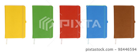 Top view of a set of multi-colored notepads isolated on a white background to create a layout. Top view of a set of multi-colored notepads isolated on a white background to create a layout. 98446594