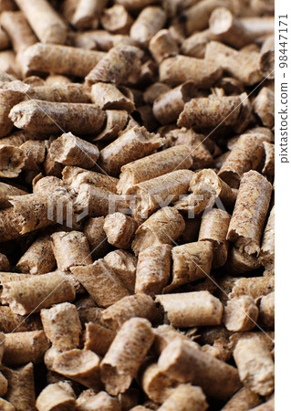 Wooden pellets in two wicker boxes. Biomass fuel Wooden pellets in two wicker boxes. Biomass fuel 98447171