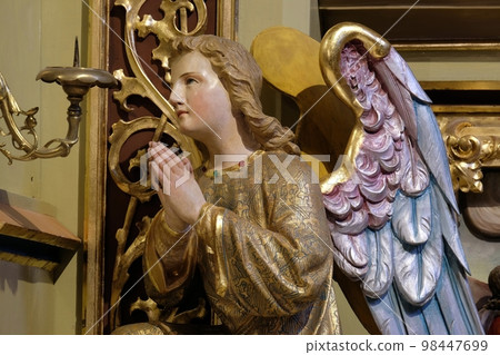 Angel statue on the altar in the church of Saint Matthew in Stitar, Croatia Angel statue on the altar in the church of Saint Matthew in Stitar, Croatia 98447699