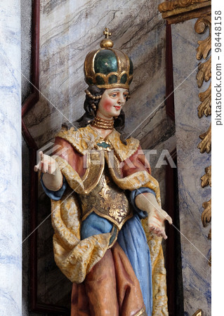 Statue of Saint Helena on the main altar in the Church of Assumption of the Virgin Mary in Pokupsko, Croatia 98448158