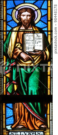 Saint Luke the Evangelist, stained glass window in parish church of Saint Mark in Zagreb, Croatia 98448178
