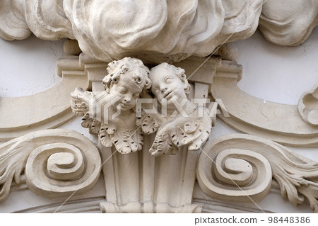 Angels on the portal of Mariahilf church in Graz, Styria, Austria 98448386