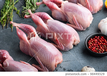 Homemade eco friendly raw quails, on grey background 98449329