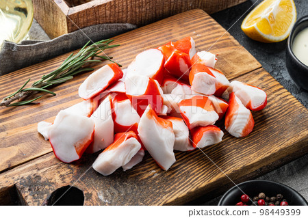 Fresh Crab meat stick surimi , on gray background 98449399