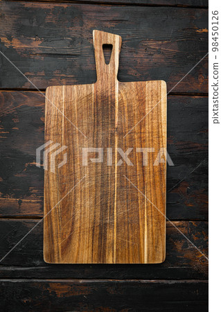 Old Cutting Board Dark Wooden Table View Copy Space Stock Photo by