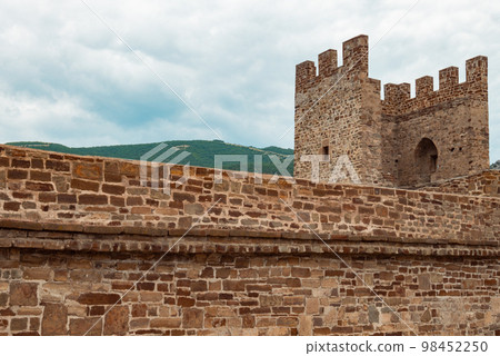 An old fortress against the blue sky. 98452250