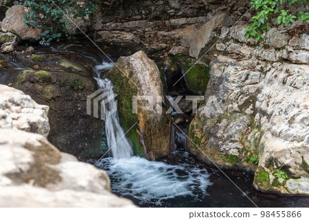 View of Kziv Stream at the end of the Black marked trail, Montfort Nahal Kziv National park, Western Galilee, Northern District of Israel, Israel. 98455866