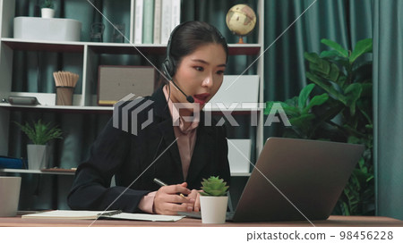 Enthusiastic female operator provide helpful customer service to customer. Enthusiastic female operator provide helpful customer service to customer. 98456228