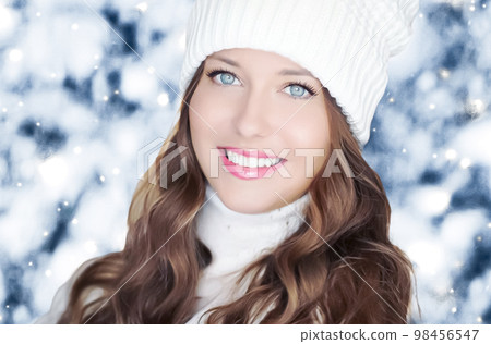 Winter holiday travel, lifestyle and fashion, beautiful happy woman and snowy forest, nature, ski resort and leisure activity outdoors Christmas, New Year and holidays portrait. 98456547