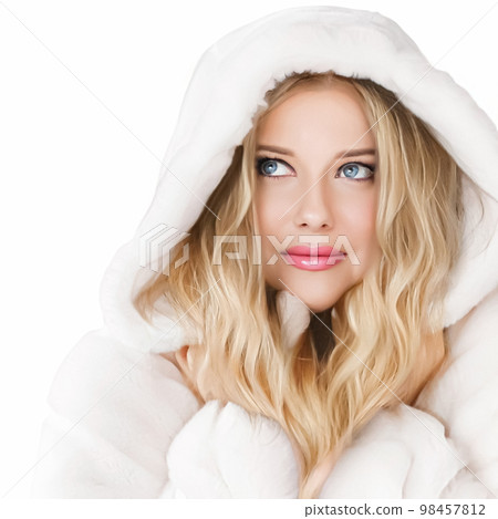 Beautiful woman in white fur coat, beauty and winter fashion. Beautiful woman in white fur coat, beauty and winter fashion. 98457812