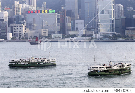 Star ferry sailing through Victoria Bay in Hong Kong Star ferry sailing through Victoria Bay in Hong Kong 98458702