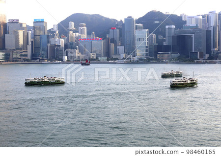 Star ferry in front of high-rise buildings in Hong Kong Star ferry in front of high-rise buildings in Hong Kong 98460165