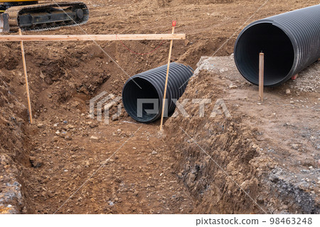 Construction site construction of underdrain pipes Construction site construction of underdrain pipes 98463248